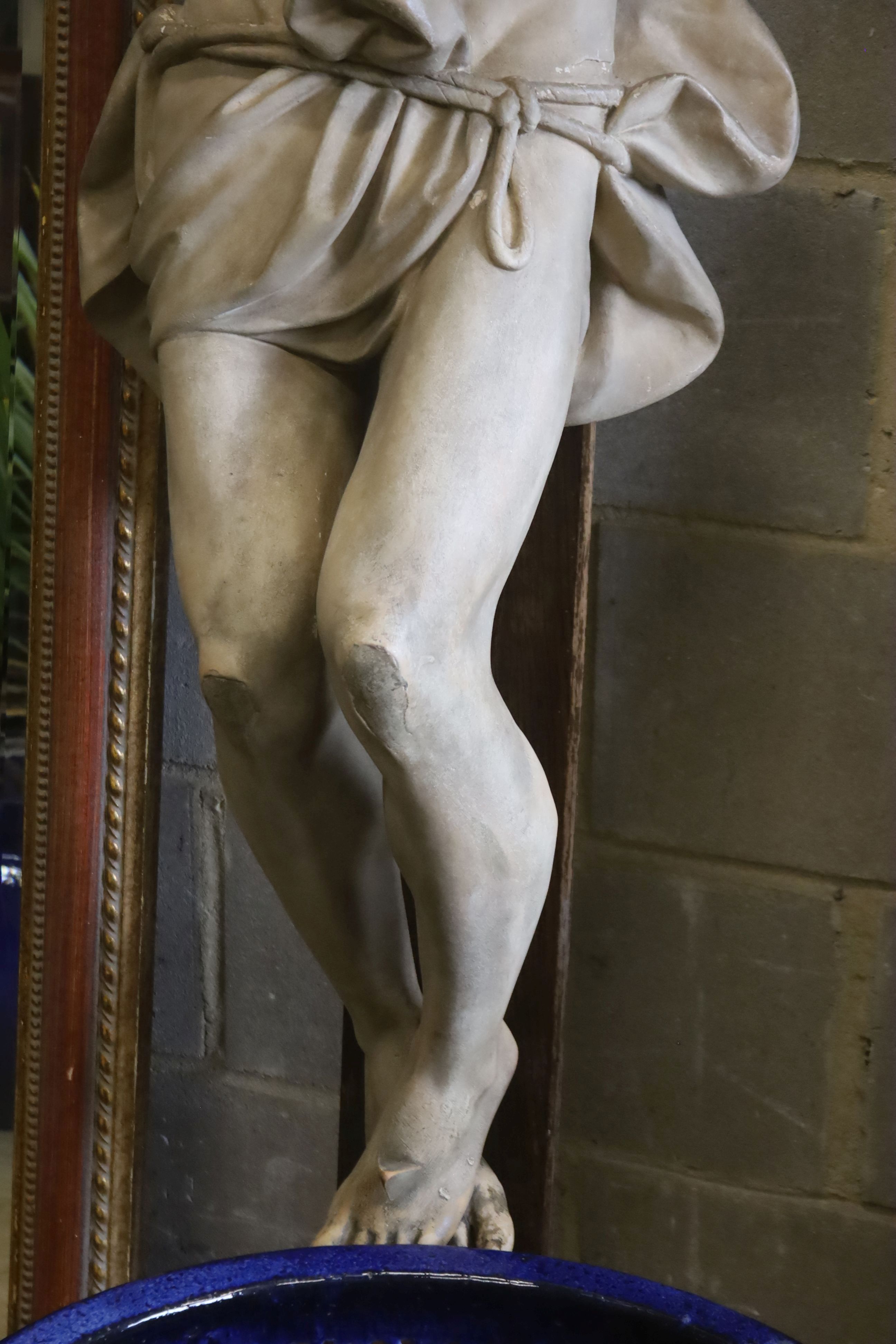 A large composition and oak crucifix, width 126cm, height 218cm